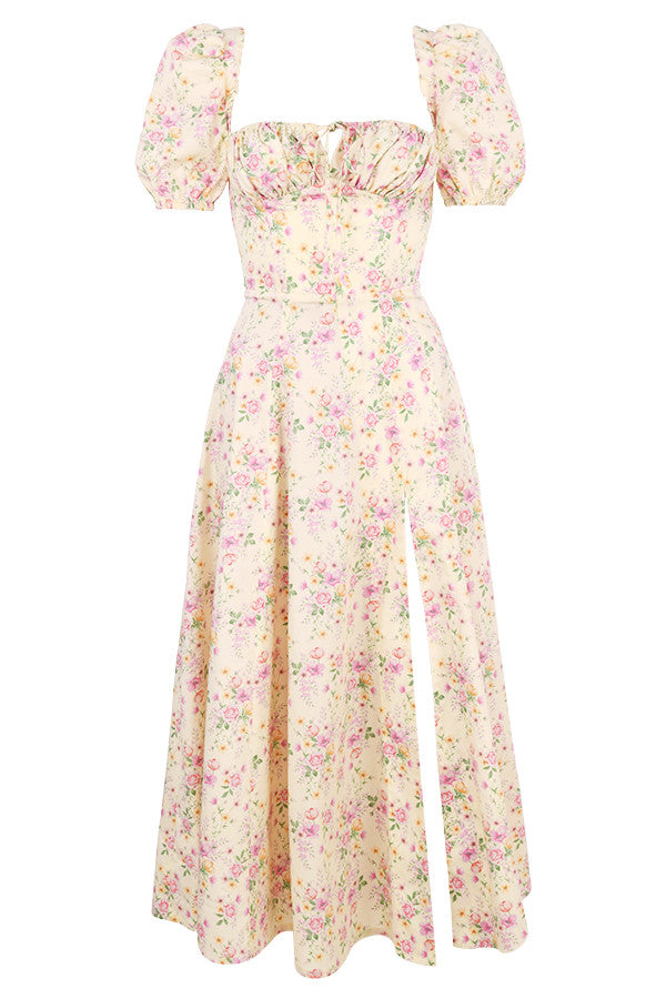 Midi solklänning med blommiga puffärmar