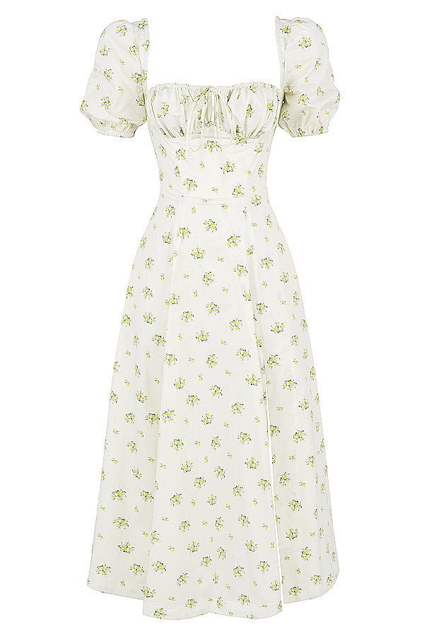 Midi solklänning med blommiga puffärmar