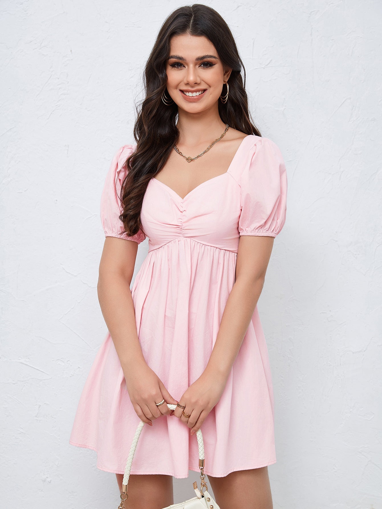 Rosa miniklänning i smal midja