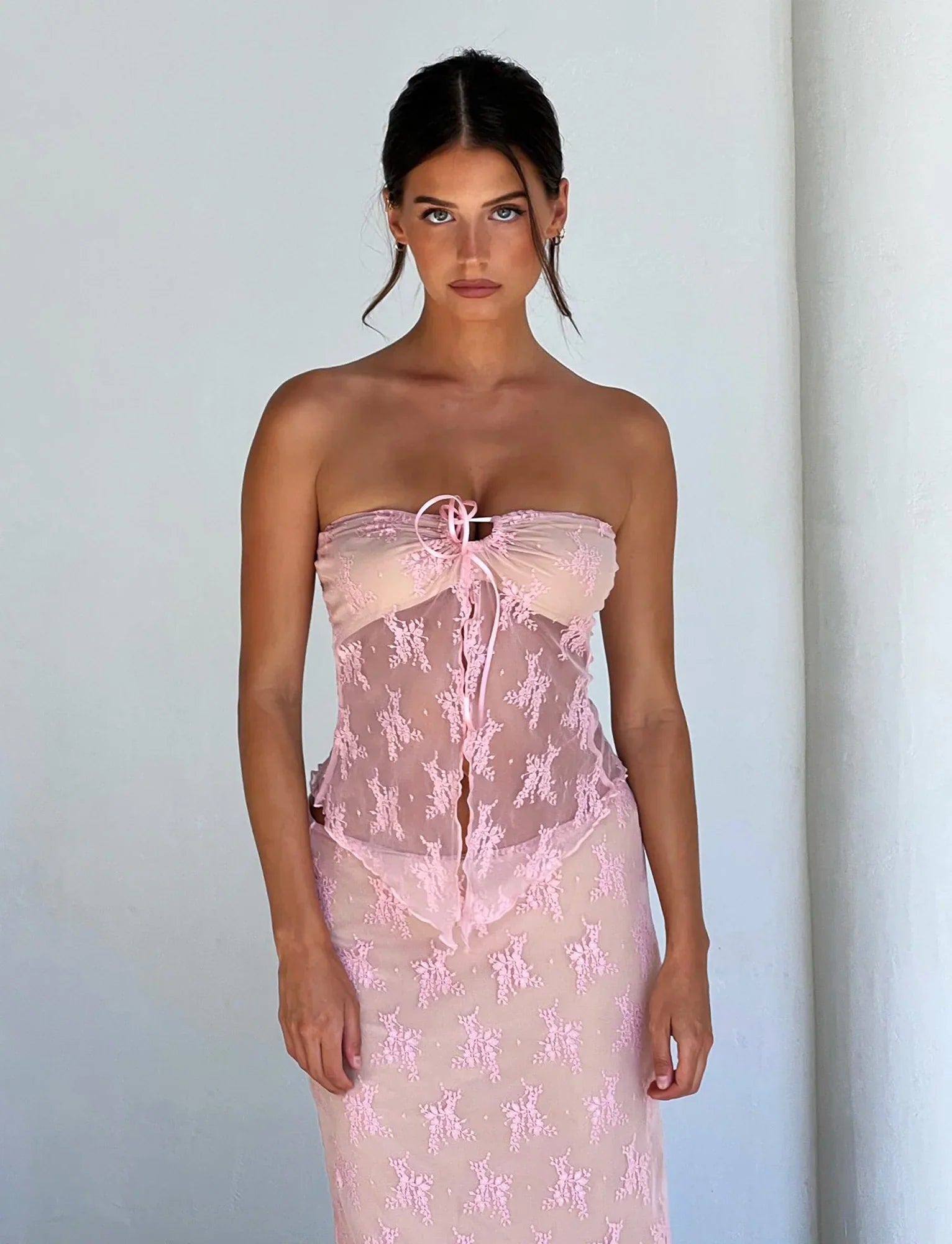 Elegant genomskinlig topp med kjol