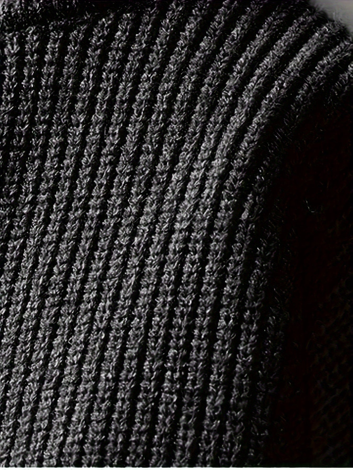 Stickad tröja med randigt mönster