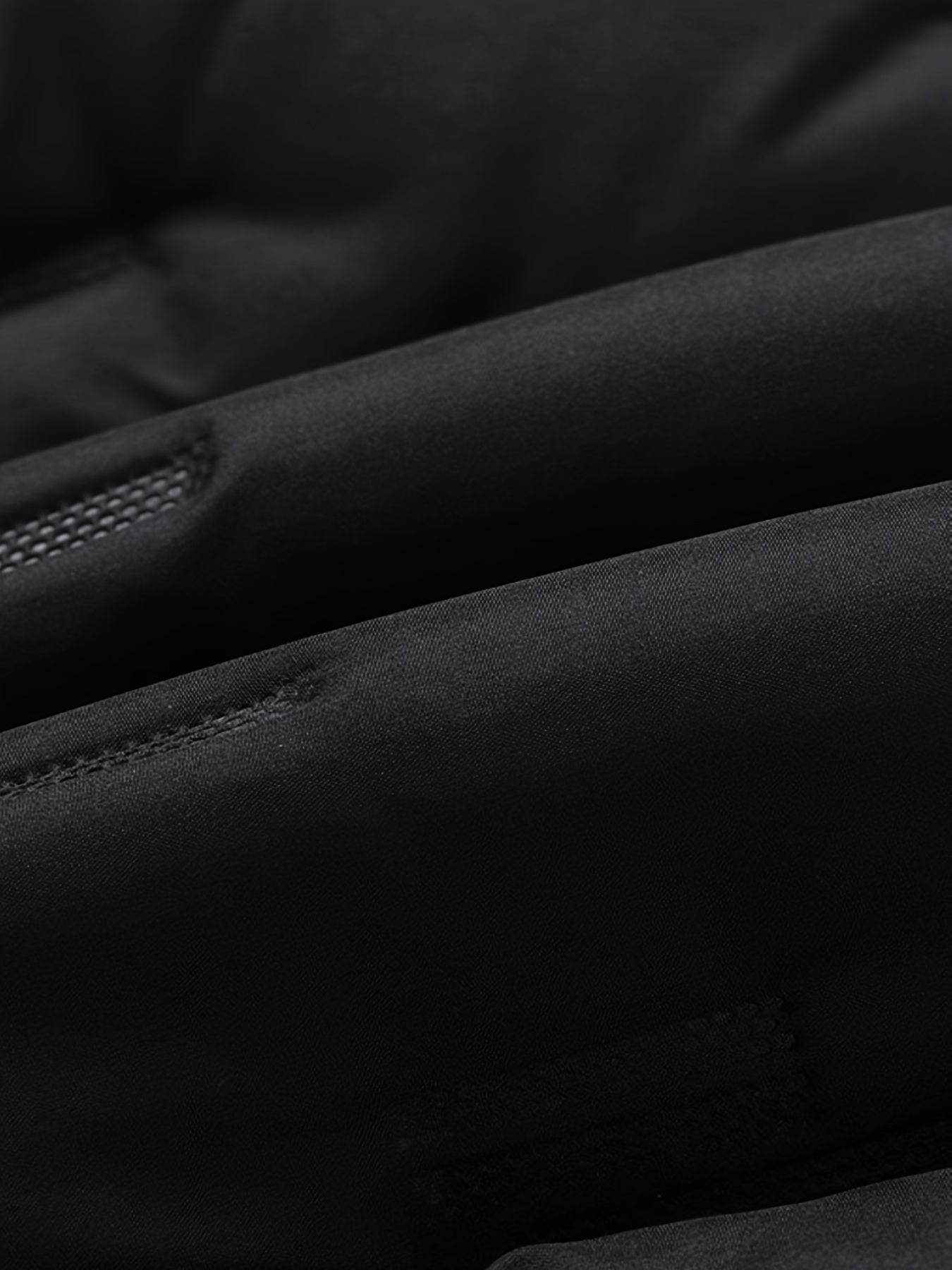 Vadderad väst med huva och dragkedja