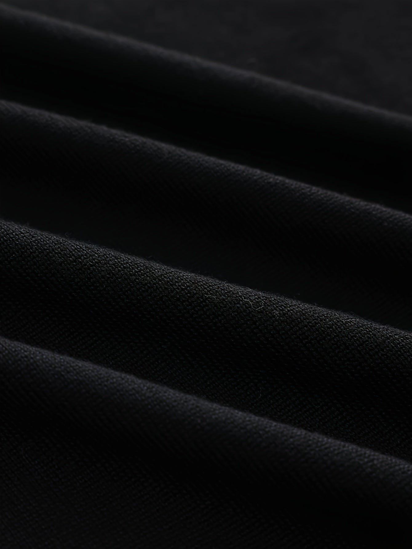 Stickad tröja med randigt mönster