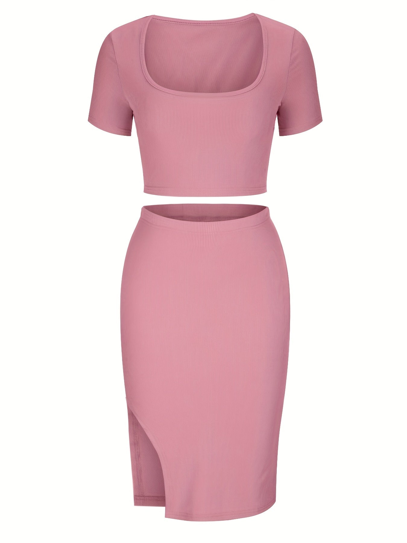 Set bestå ende av en crop top med utskärning och en passande kjol med slits