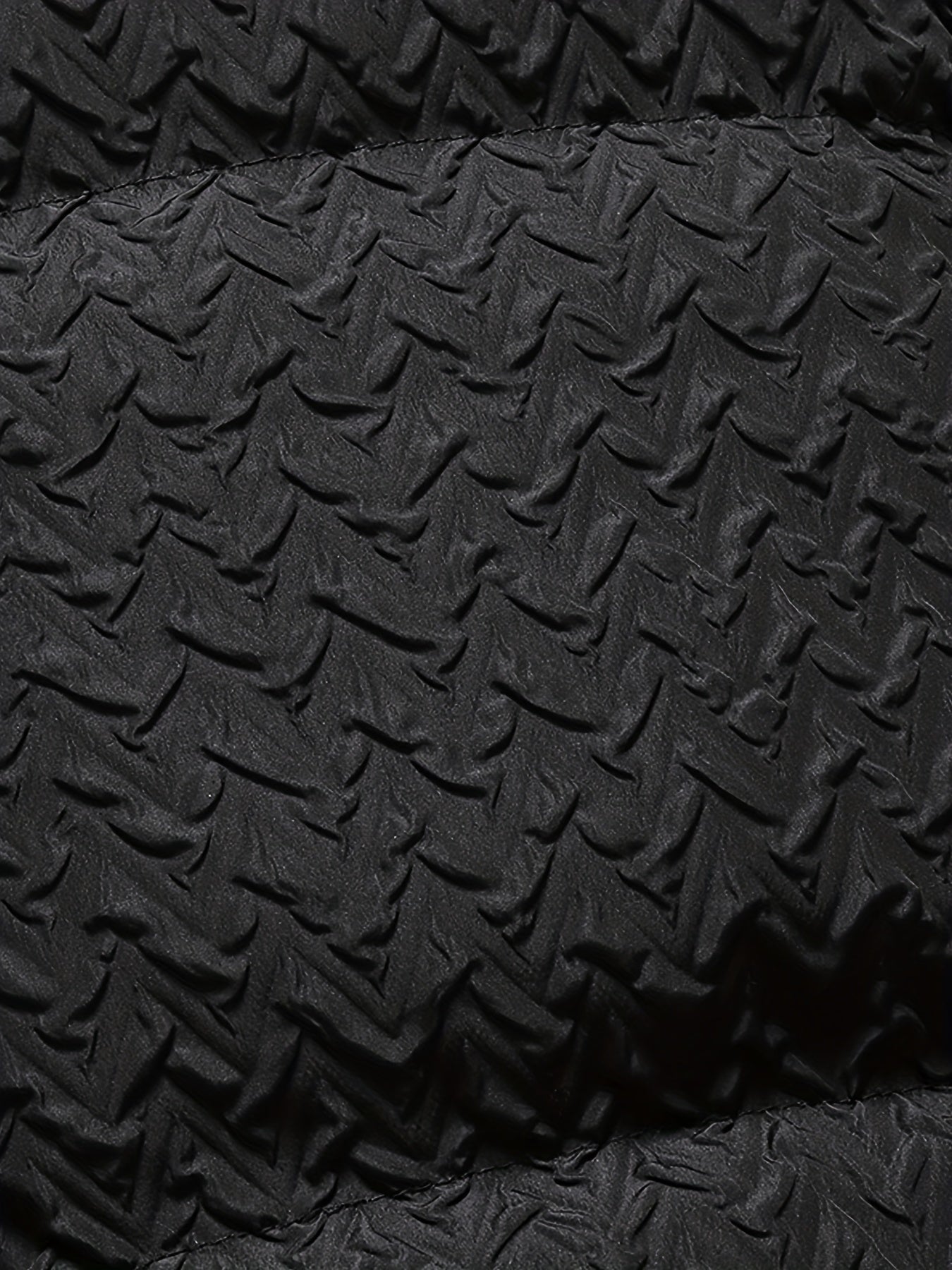 Svart jacka med struktur i fleece