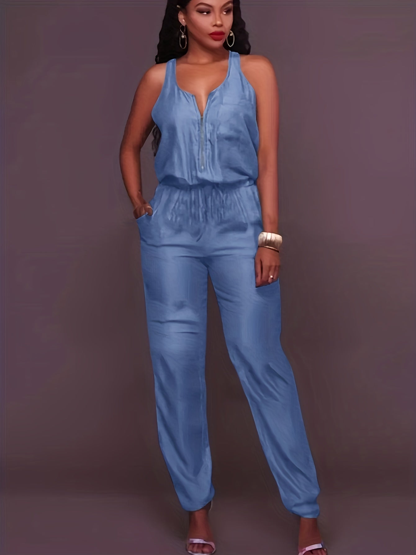 Denim jumpsuit med dragkedja fram och midjeband