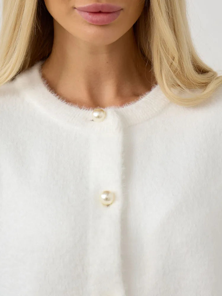 Stickad kofta i ull i minkliknande färg