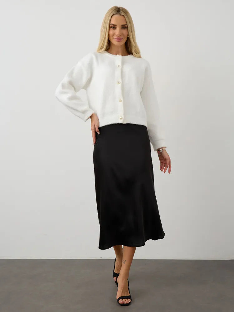 Stickad kofta i ull i minkliknande färg