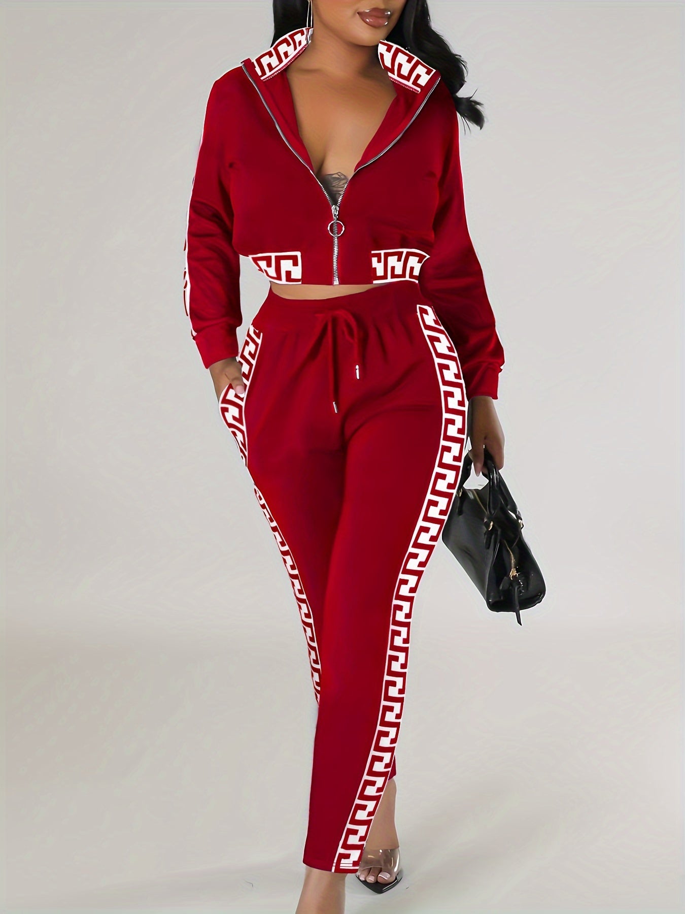 Sportväst och byxor med kontrasterande detaljer