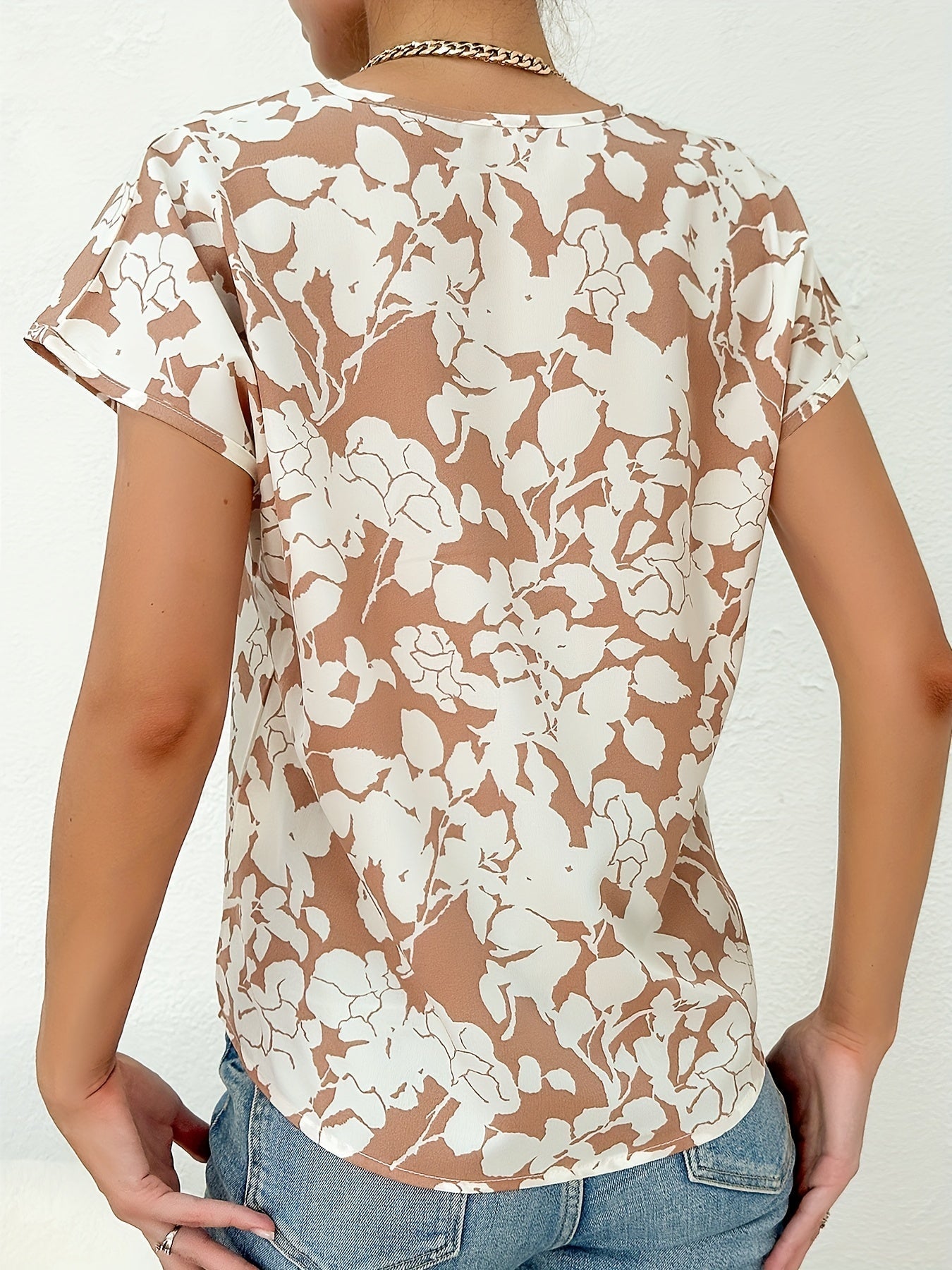 Blus med blommönster