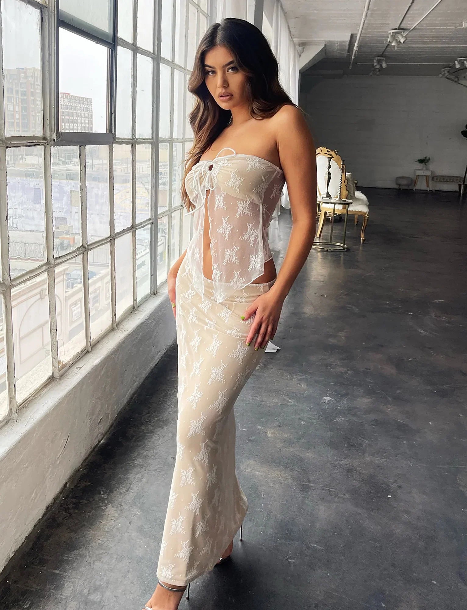 Elegant genomskinlig topp med kjol