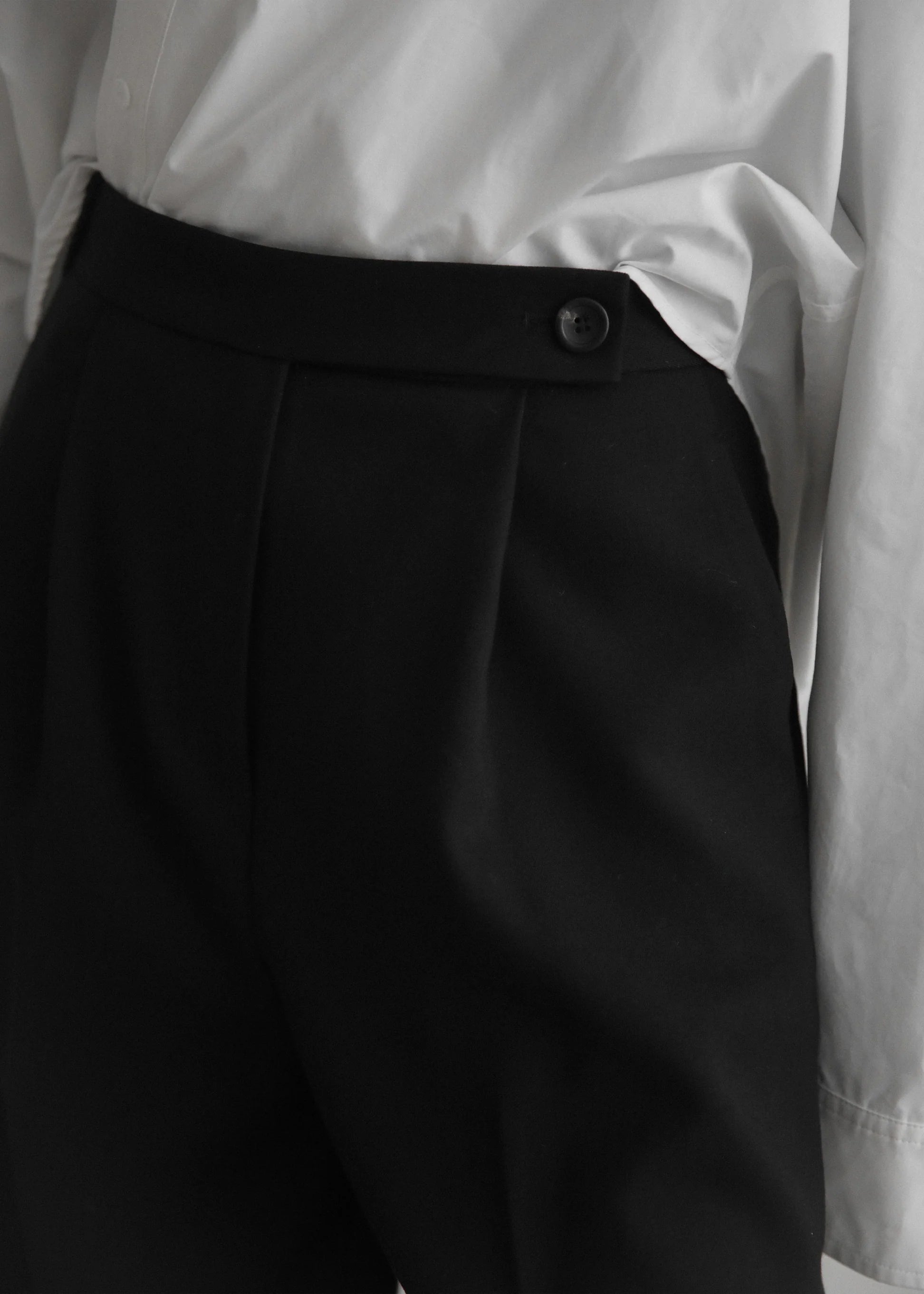 Klassiska byxor med vida ben