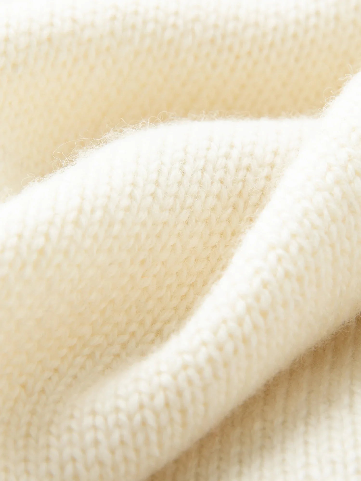 Ärmlös V-ringad ullväst