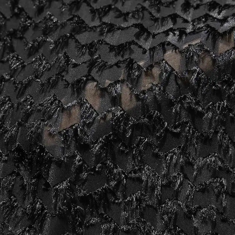 Textur lös svart skjorta med byxor