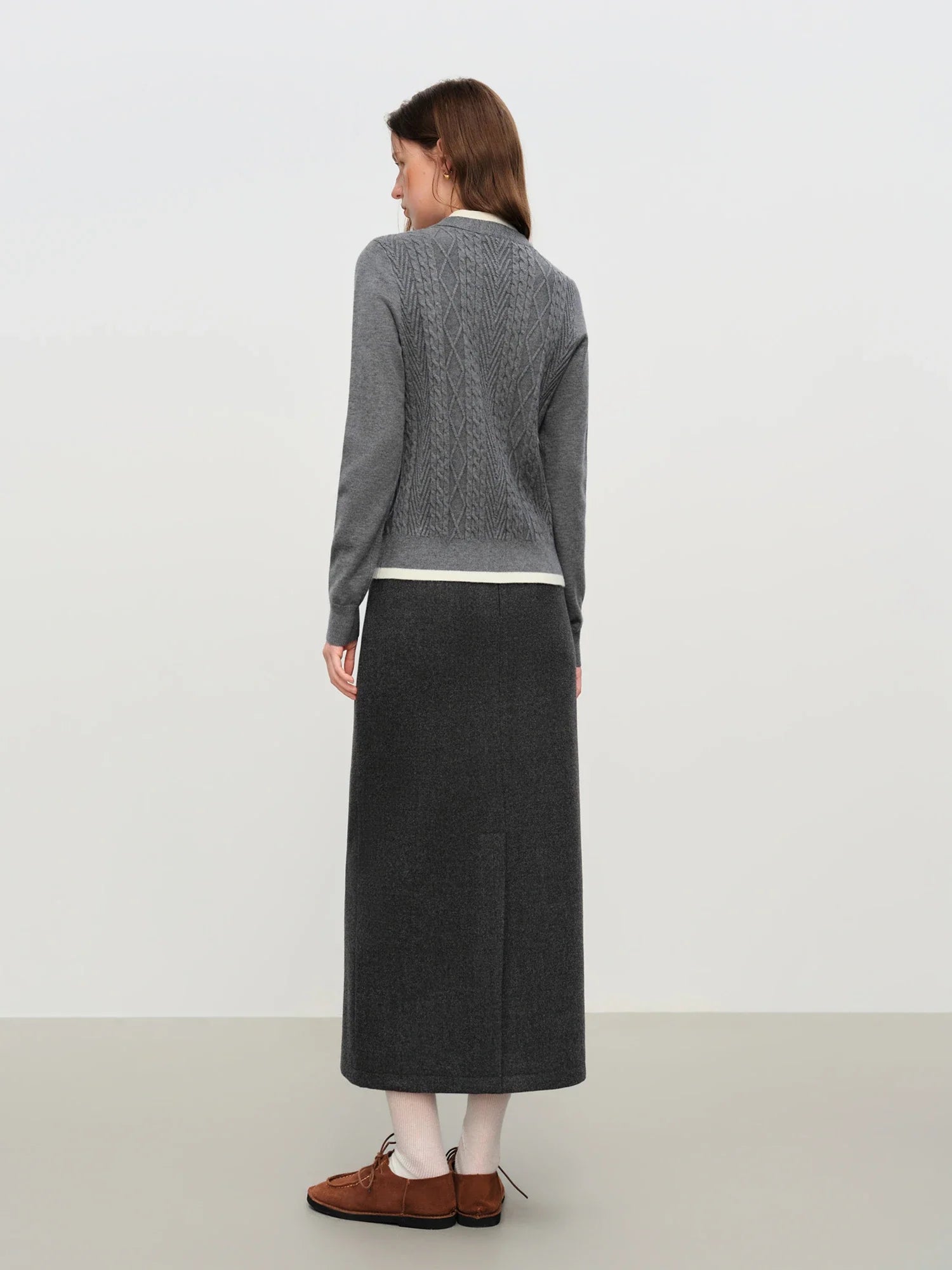 Stickad kofta i två delar