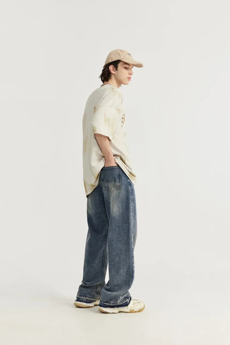 Frasade tvättade jeans med vida ben