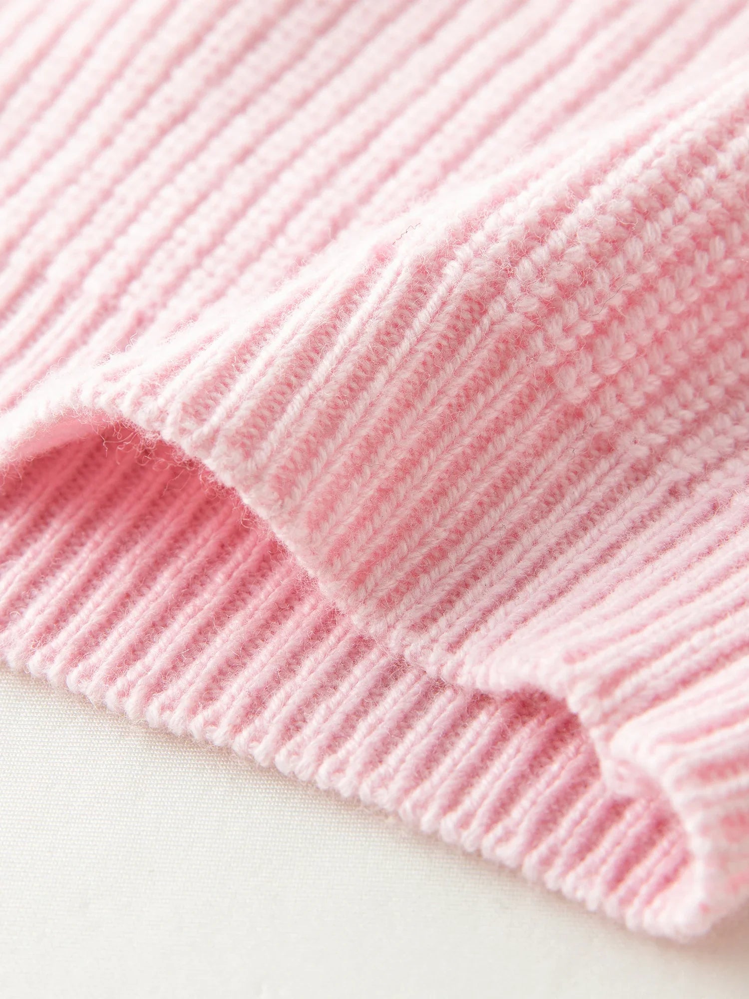 Stickad kofta i ullblandning med dubbel dragkedja