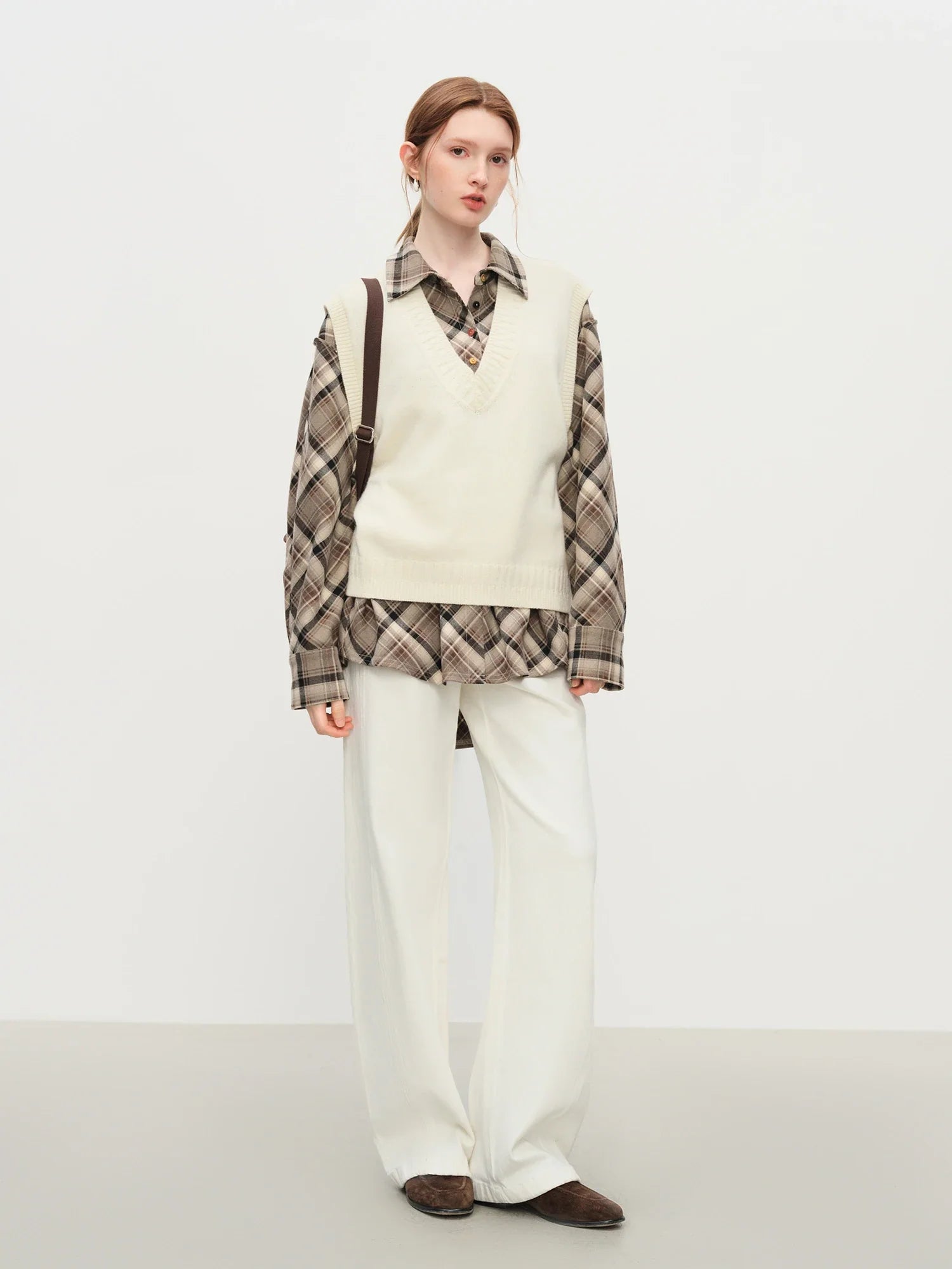 Ärmlös V-ringad ullväst