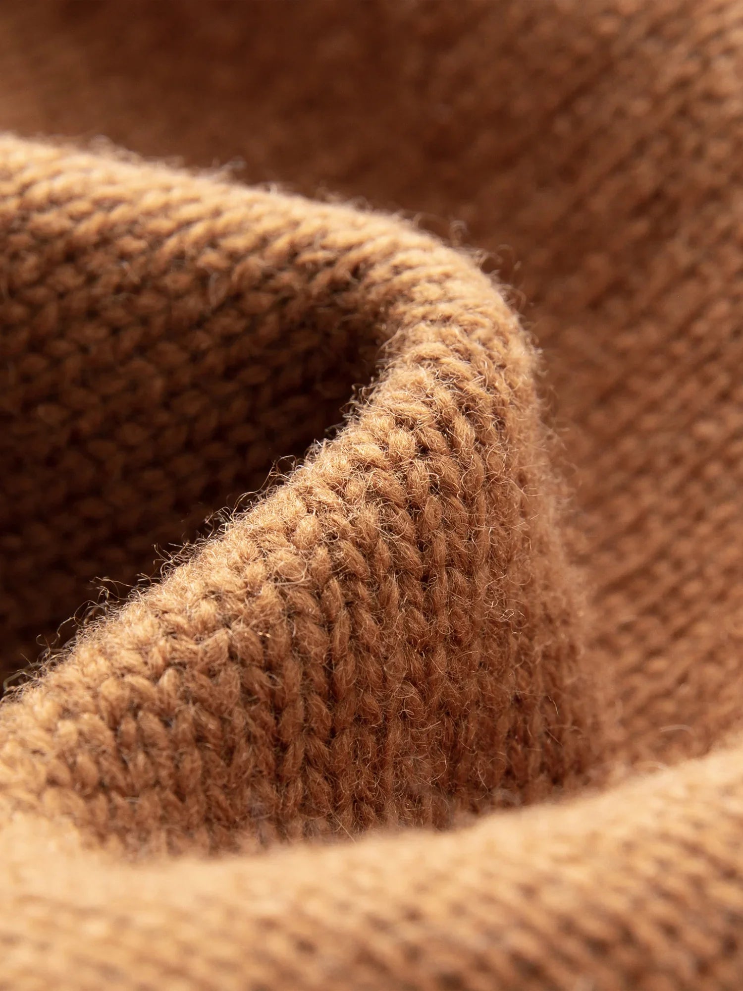 Ärmlös V-ringad ullväst