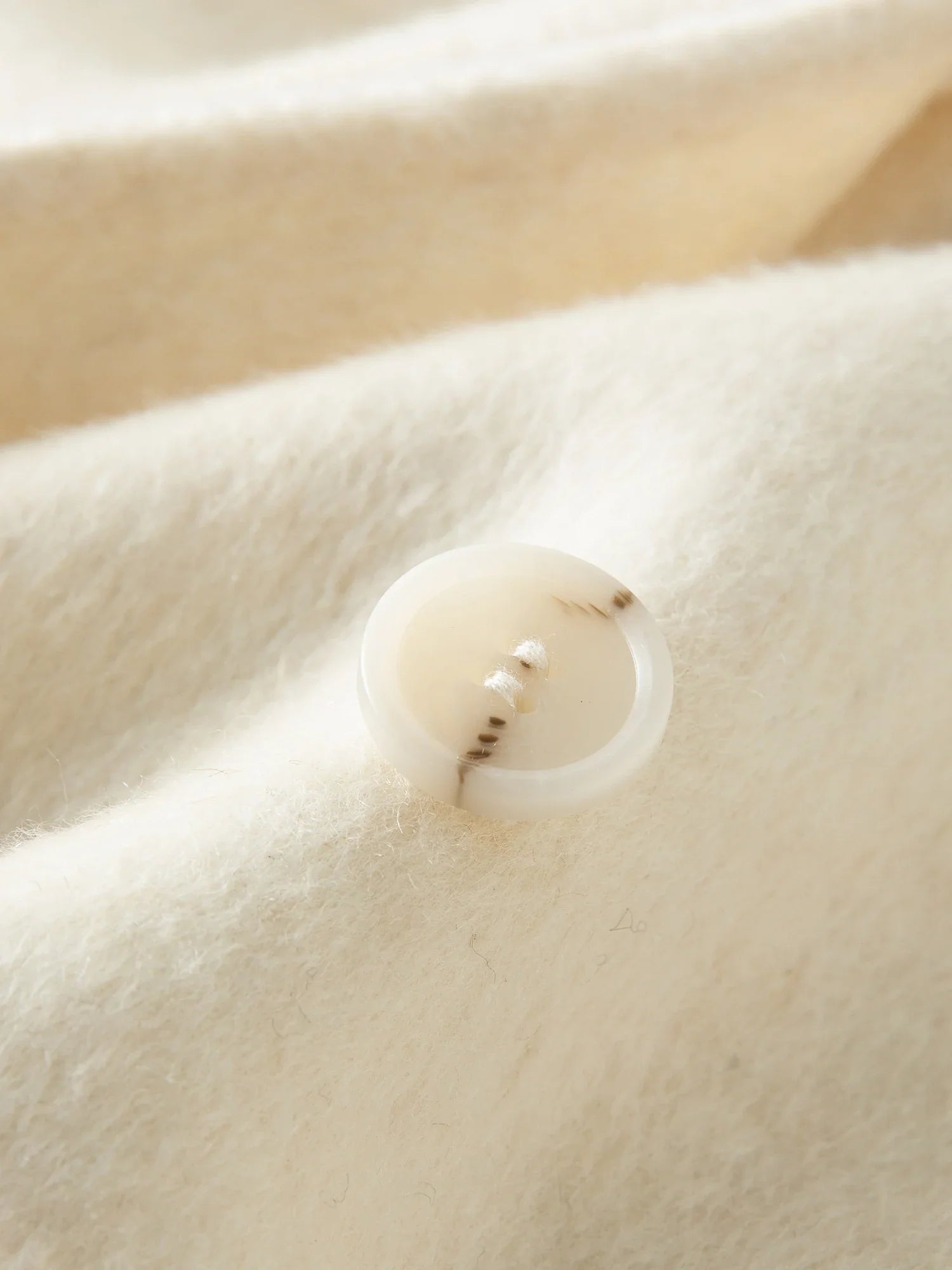 Lång ullkappa med dubbelsidig design