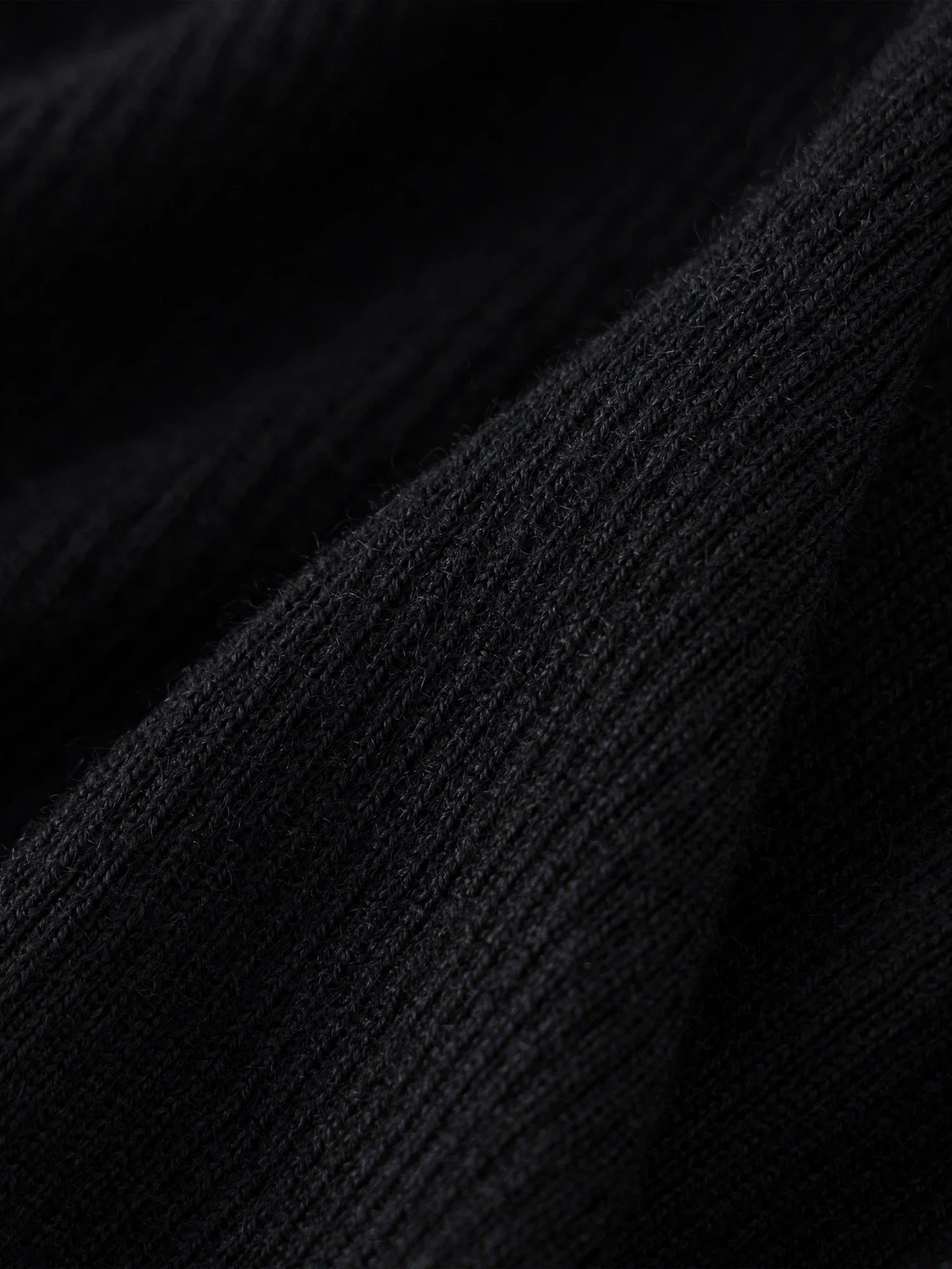 Asymmetrisk stickad ulltröja