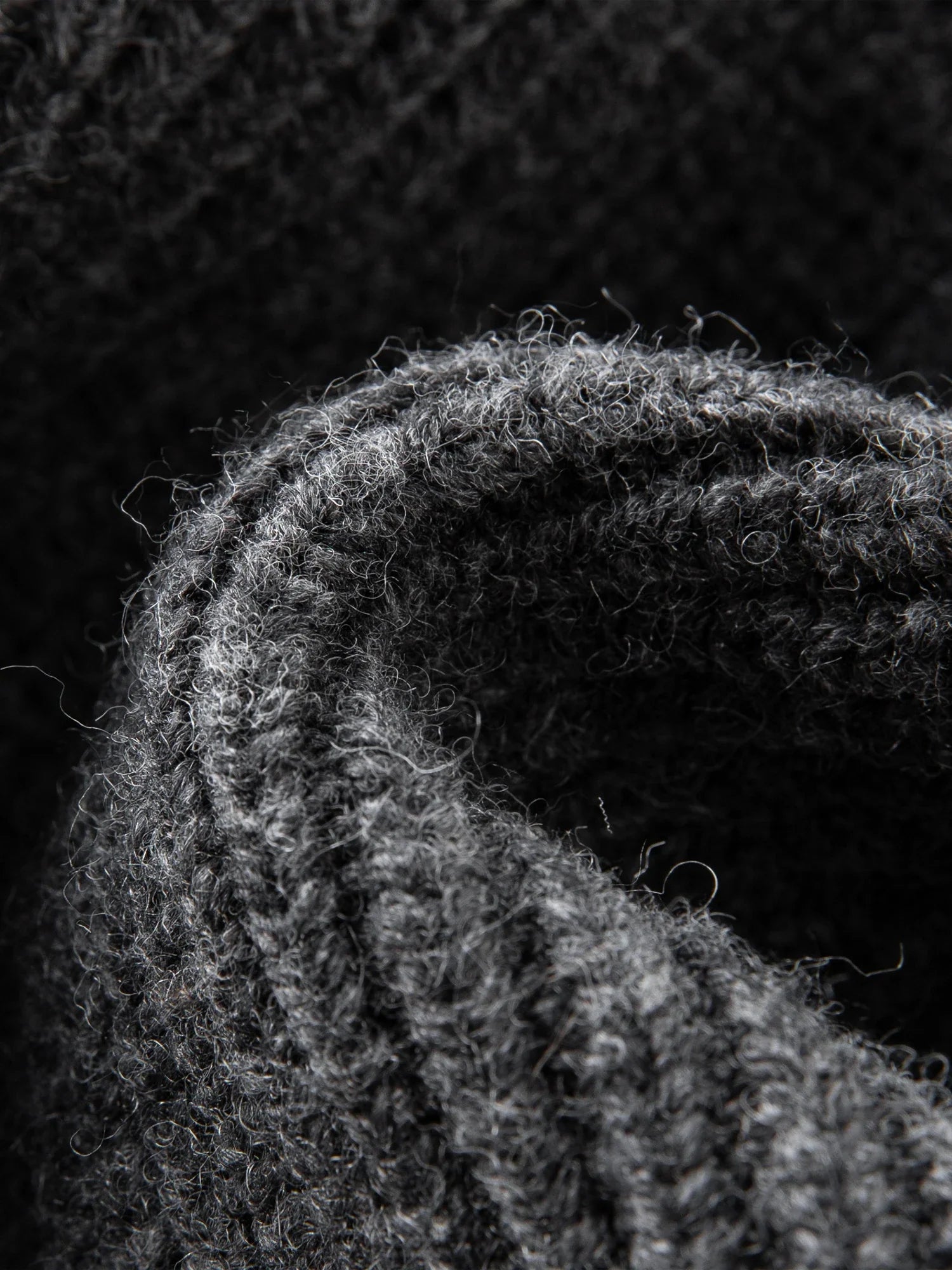 Stickad kofta i ullblandning med dubbel dragkedja