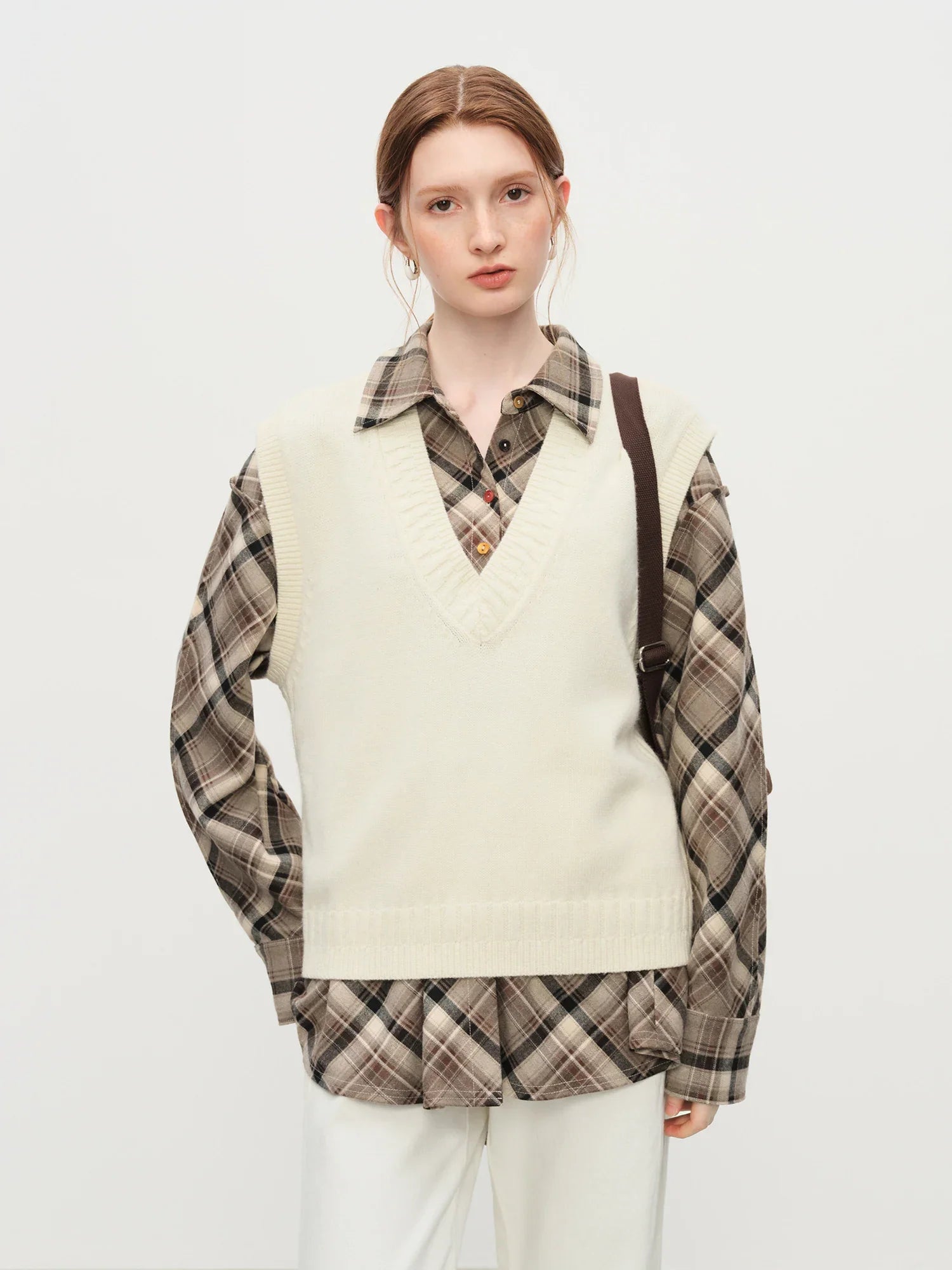 Ärmlös V-ringad ullväst