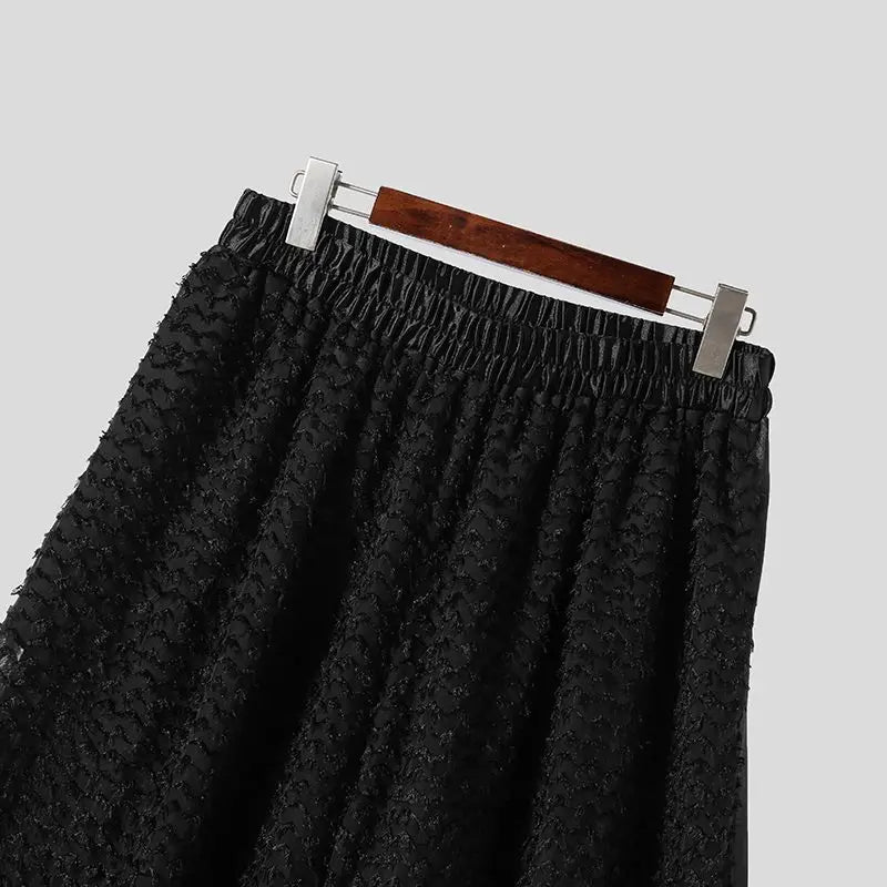 Textur lös svart skjorta med byxor