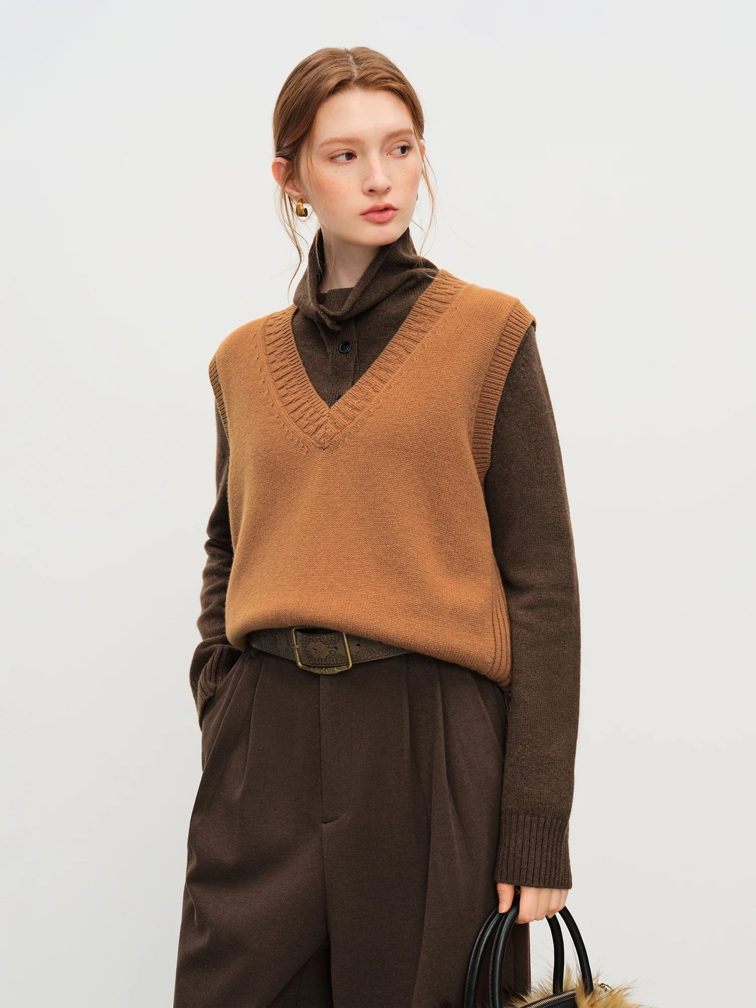 Ärmlös V-ringad ullväst