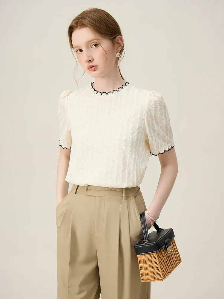 Tunn stickad ärmlös vit topp