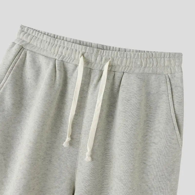 Lå ngärmad sweatshirt och huvshorts