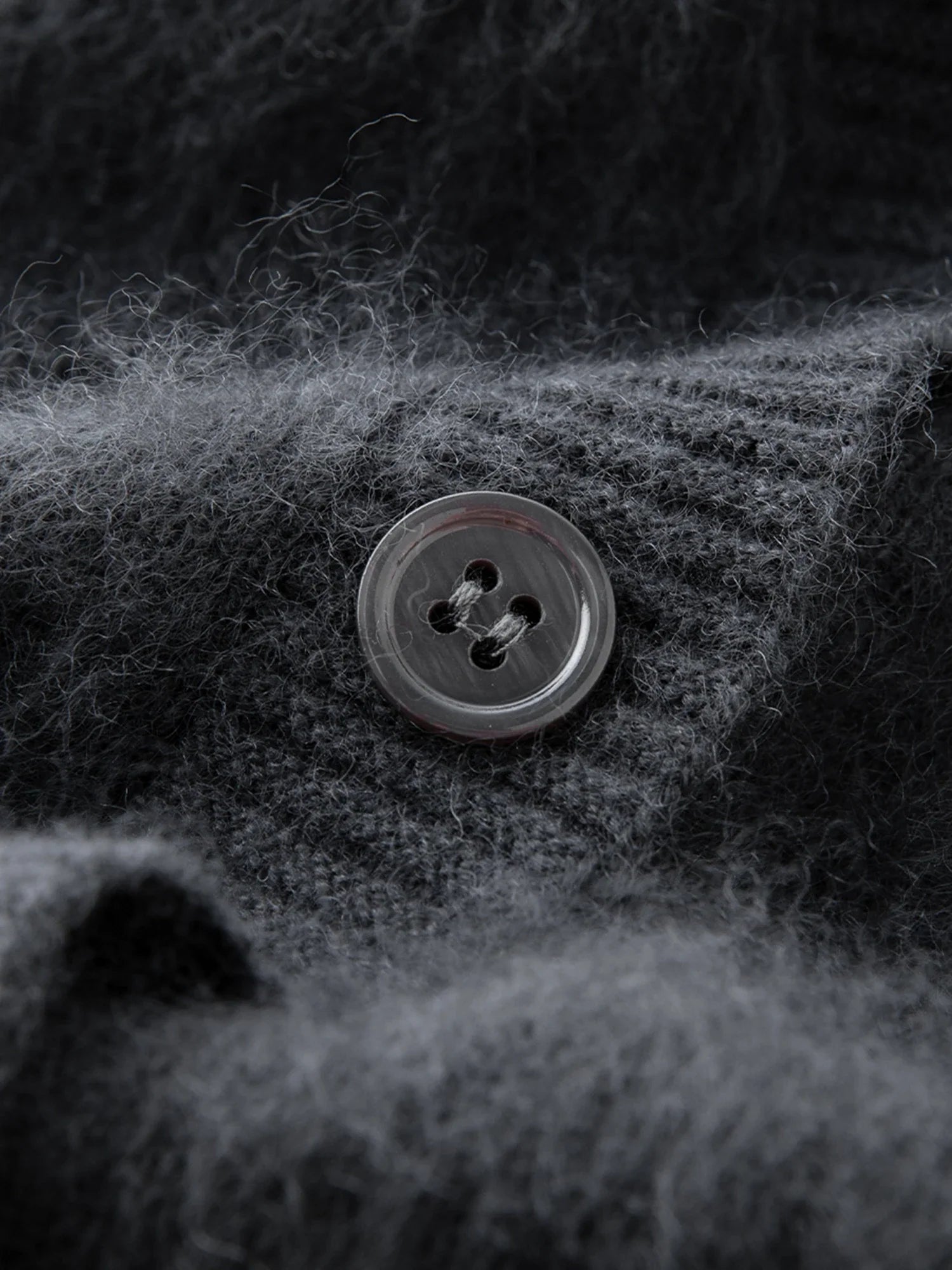 Stickad kofta i ullblandning