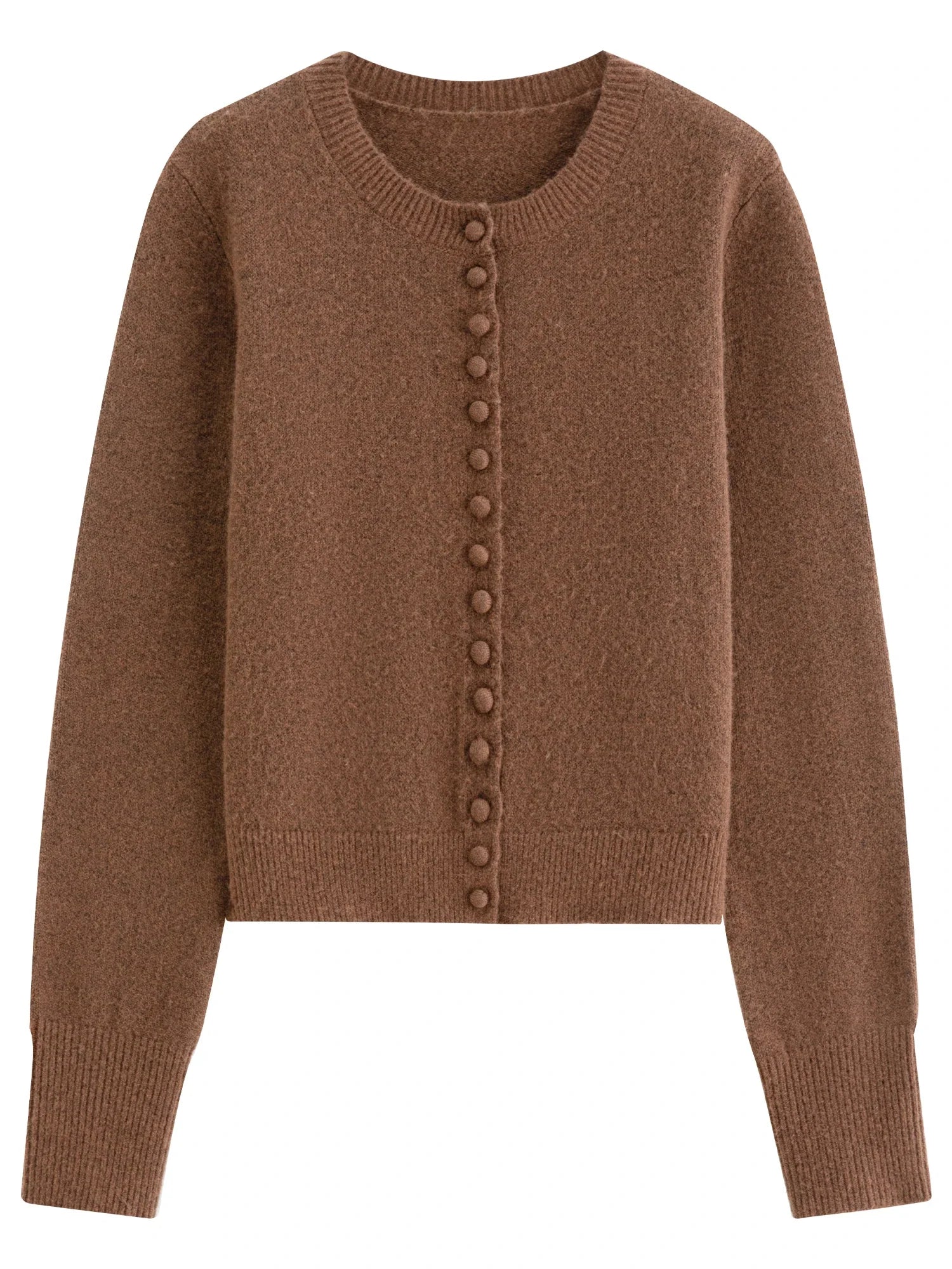 Stickad kofta i blandad stickning med ullknappar