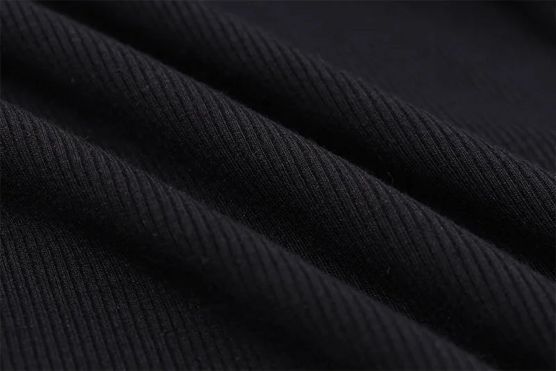 Off shoulder stickad svart klänning