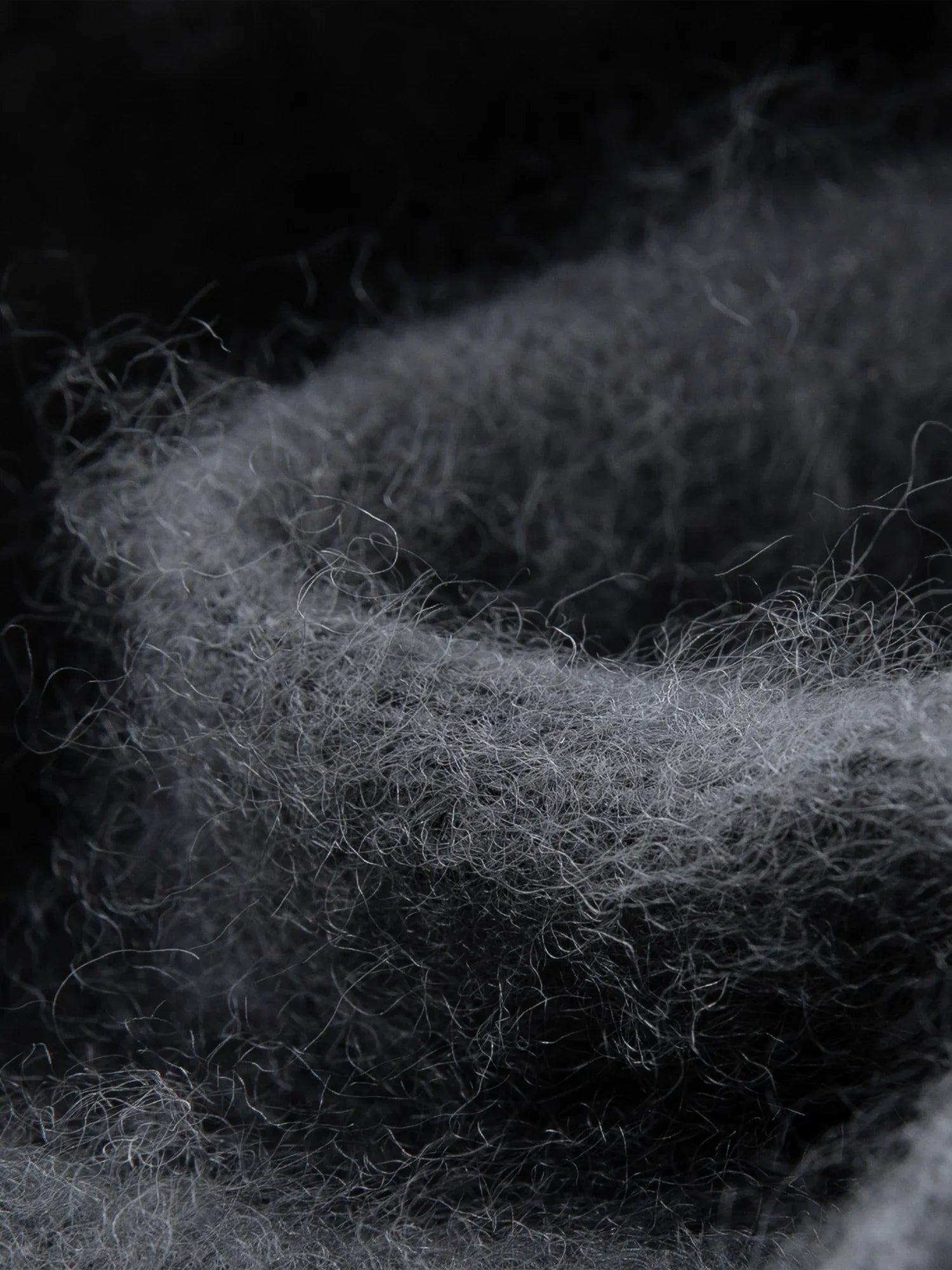 Stickad kofta i ullblandning