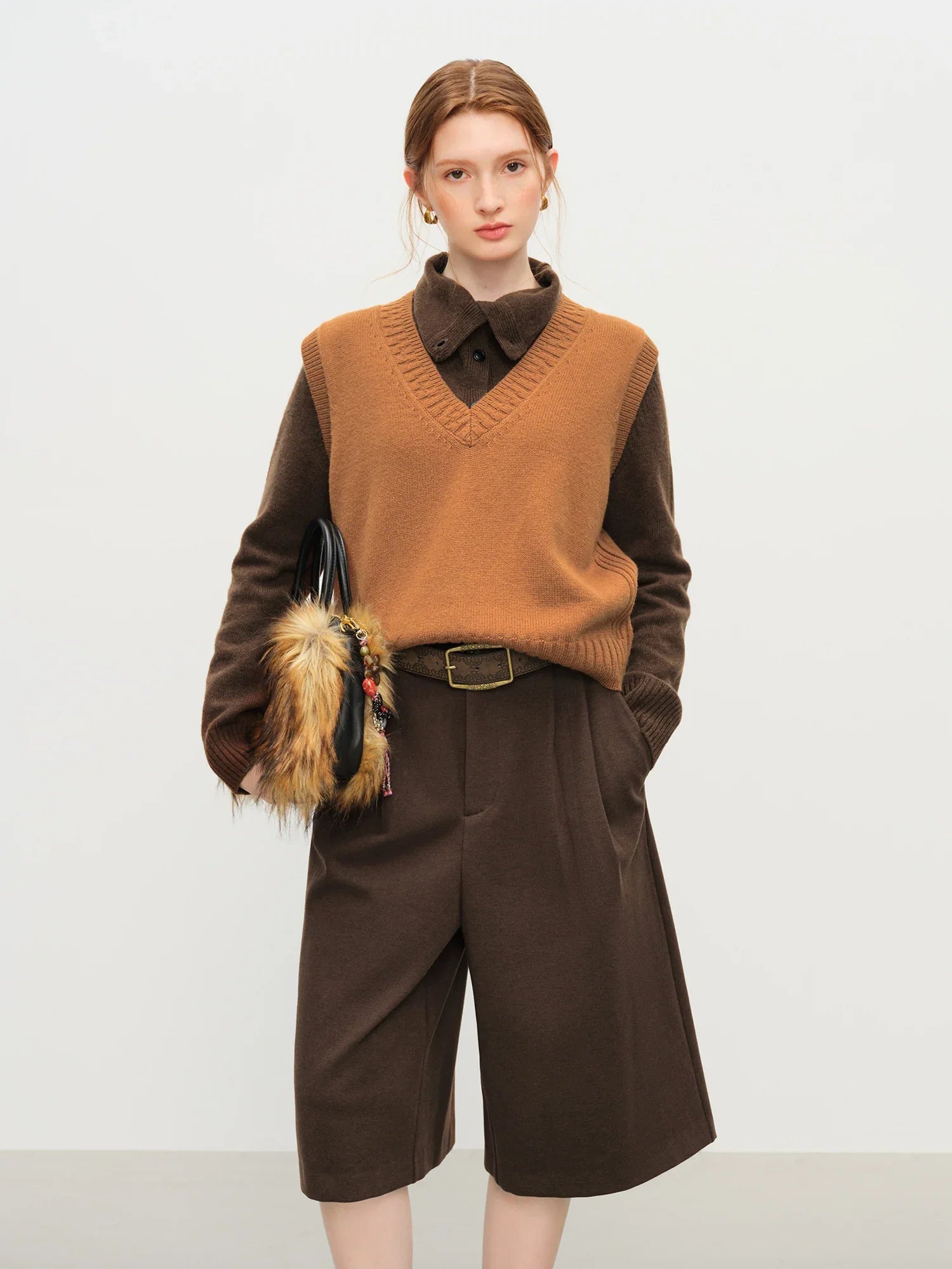 Ärmlös V-ringad ullväst