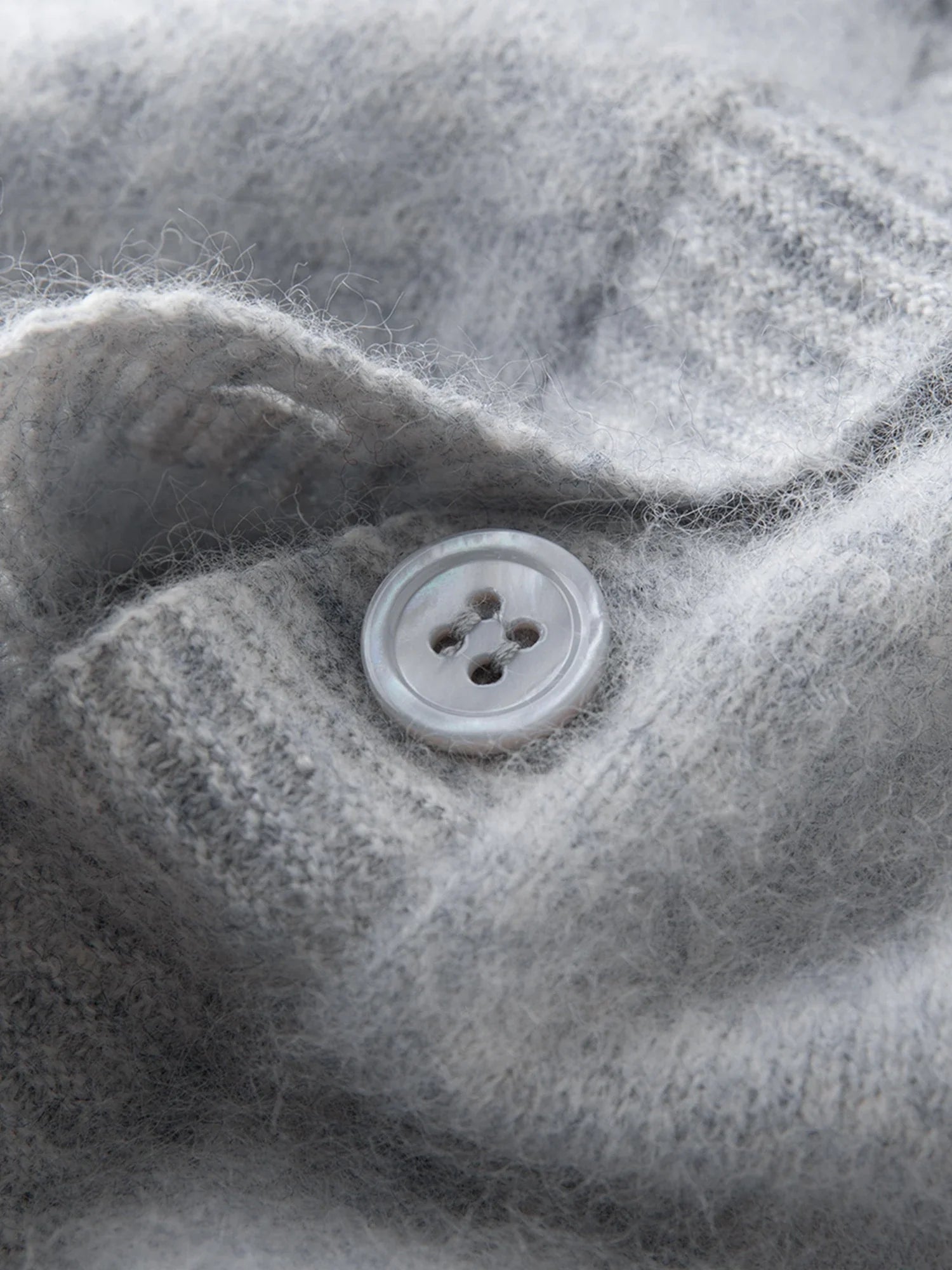 Stickad kofta i ullblandning