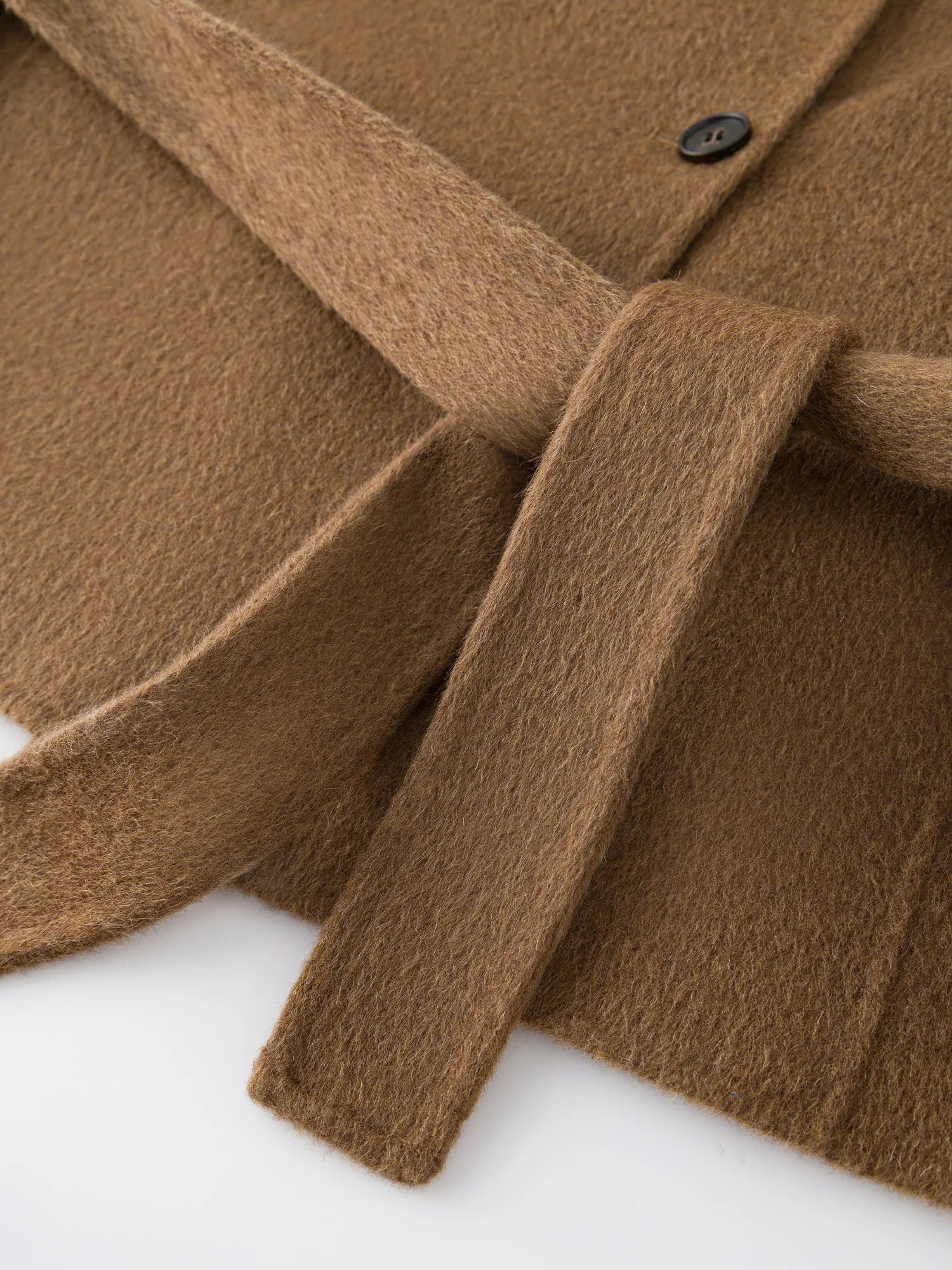 Liten dubbelsidig ullkappa