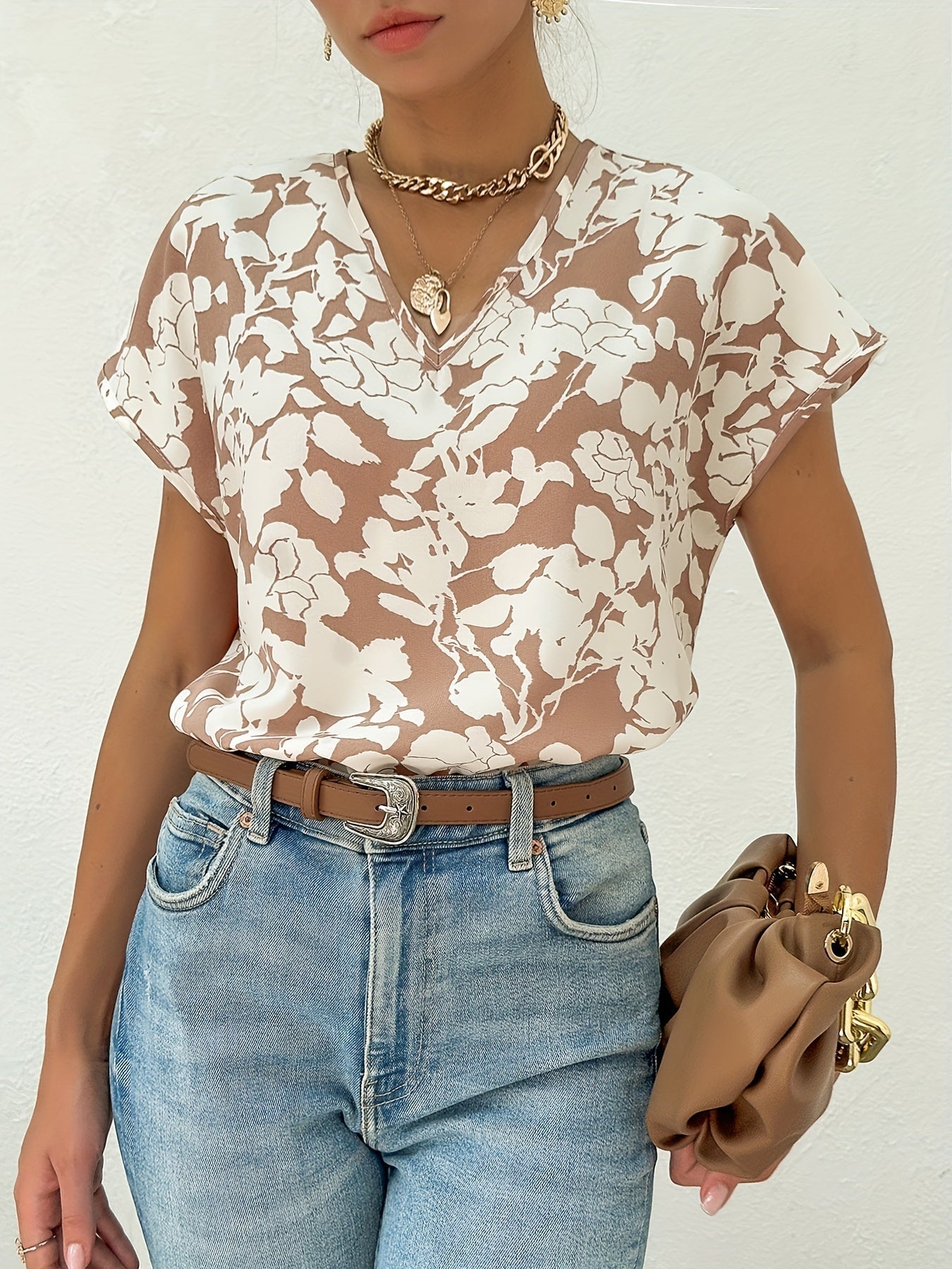 Blus med blommönster