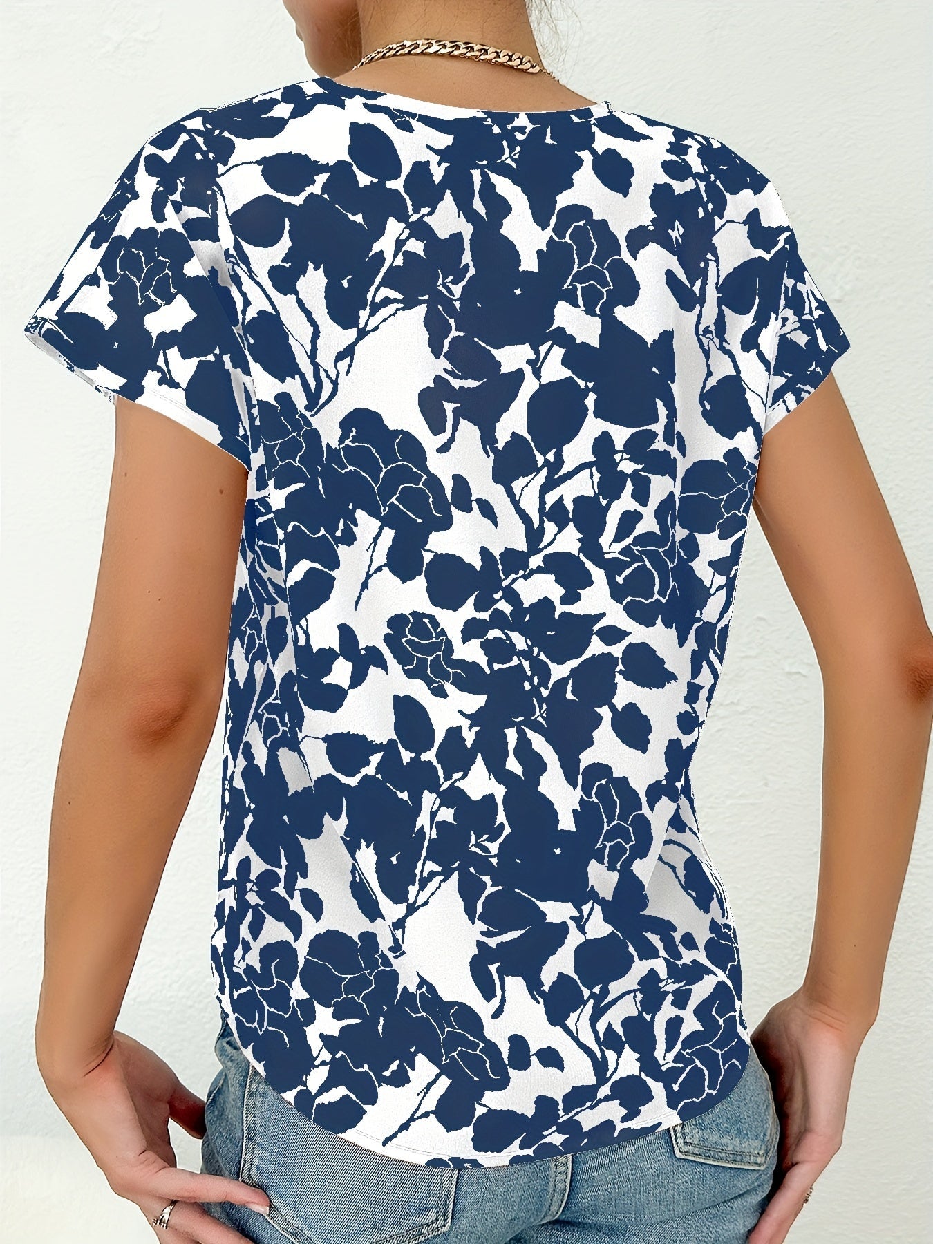 Blus med blommönster