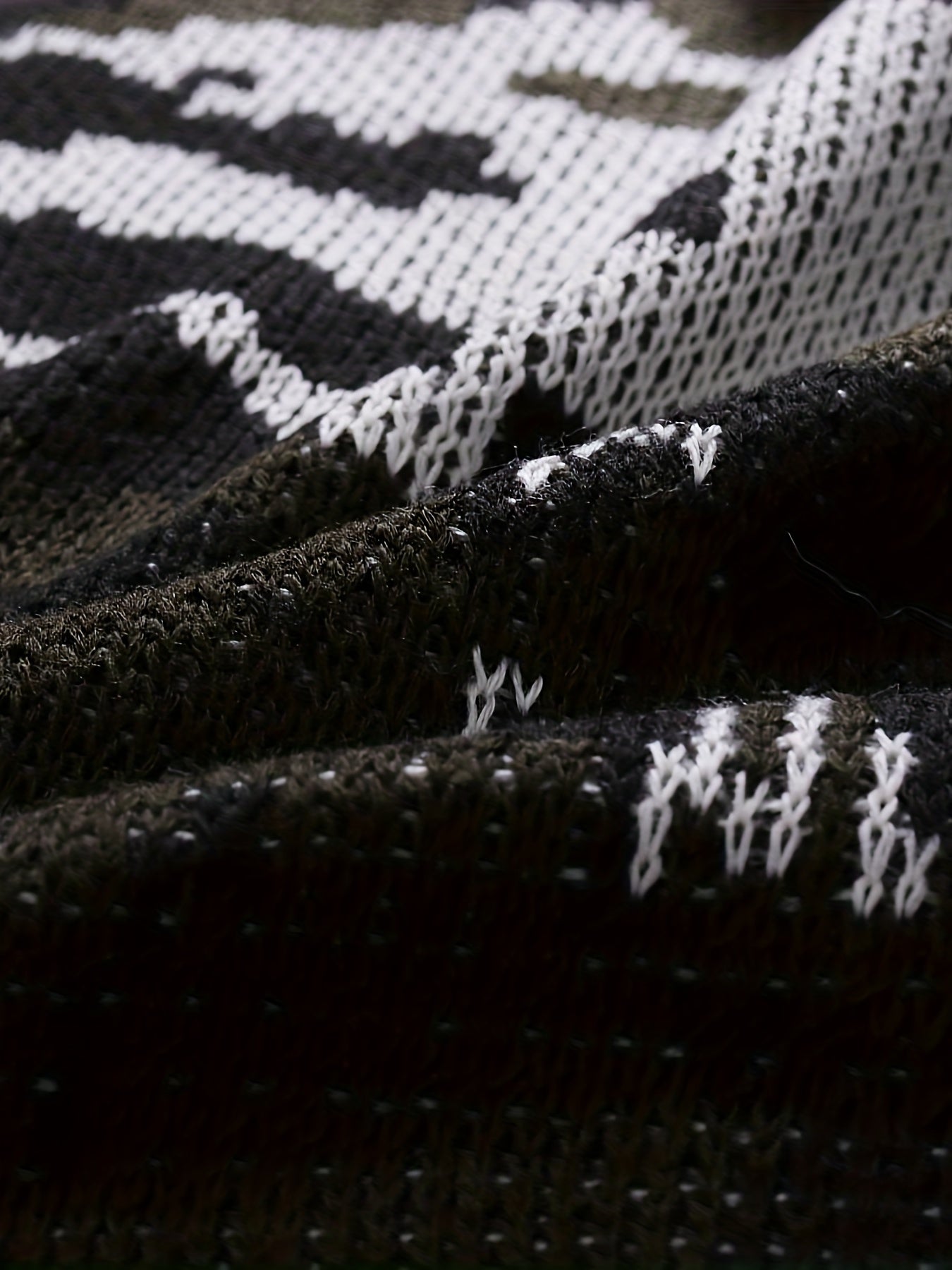 Tröja med kamouflagetryck