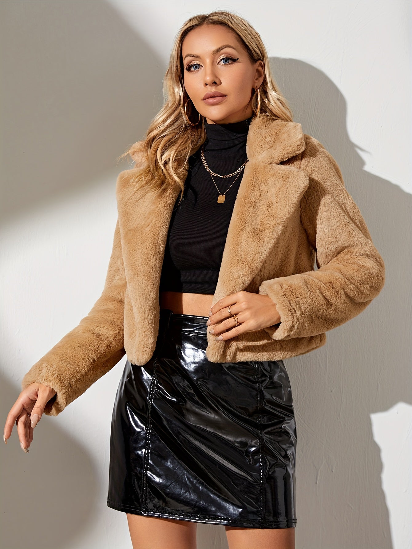 Mjuk jacka med öppen framsida