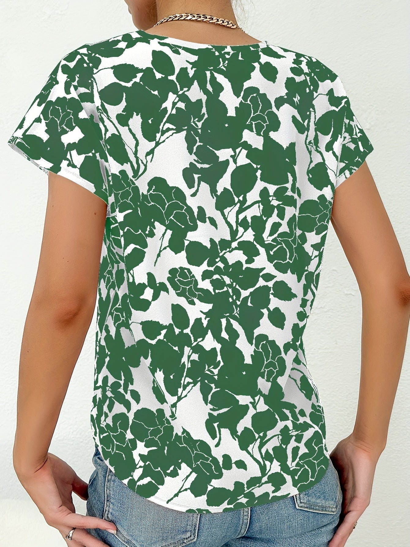 Blus med blommönster