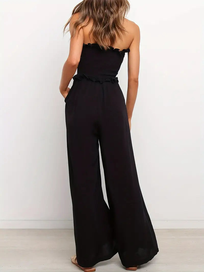 Svart jumpsuit med trasiga axlar
