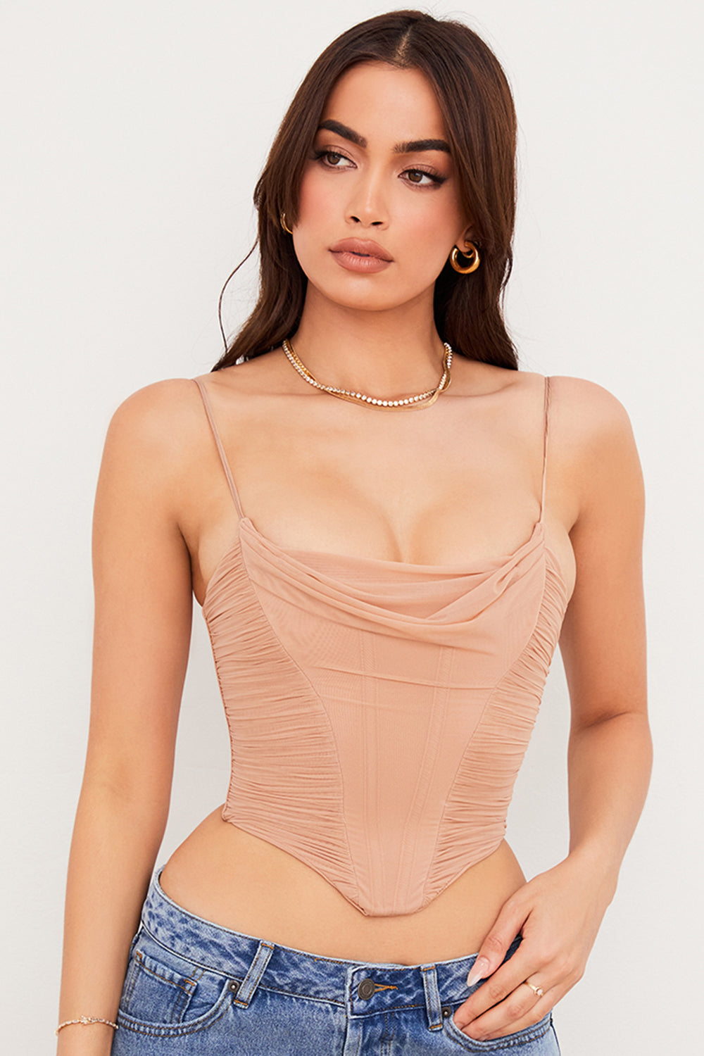 Draperad korsett i beige mesh