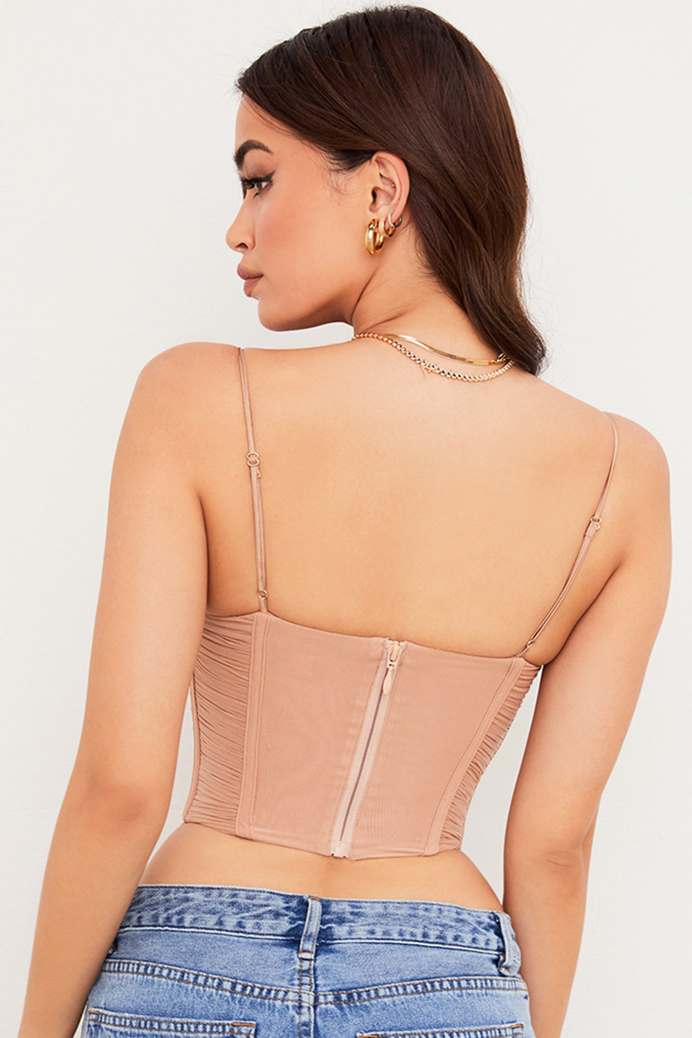 Draperad korsett i beige mesh
