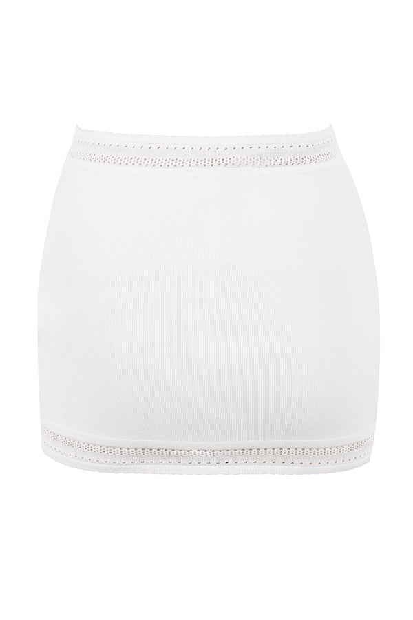 Elfenbensfärgad elegant ribbstickad topp med minikjol