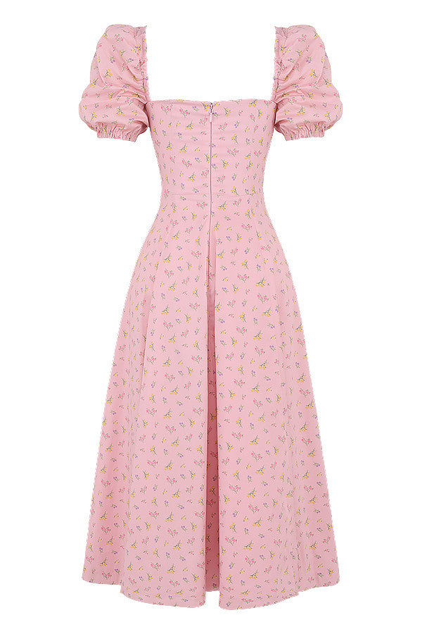 Midi solklänning med blommiga puffärmar