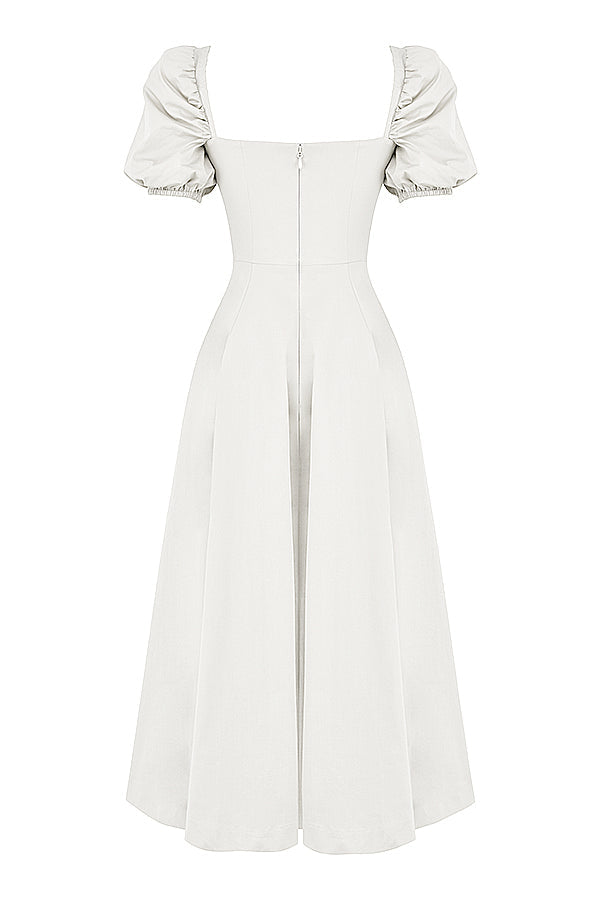 Midi solklänning med puffärmar