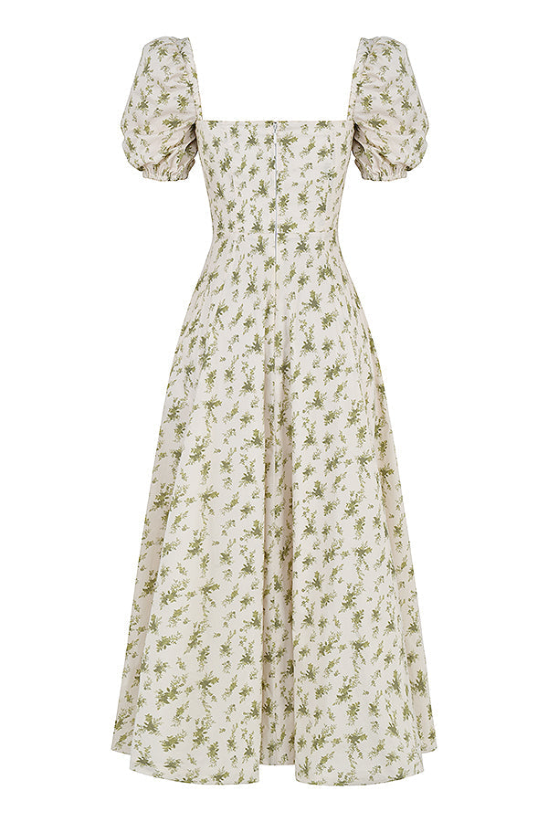 Midi solklänning med blommiga puffärmar